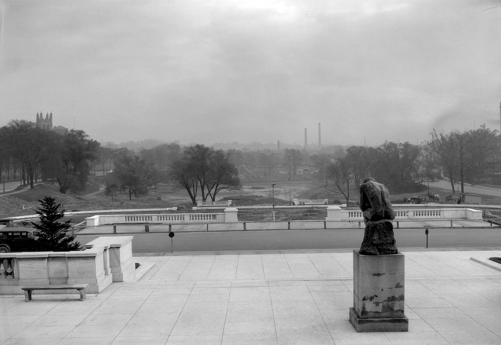 The Cleveland Museum of Art’s south terrace from with Rodin’s The Thinker in the foreground and the museum’s garden under construction in the background, 1916