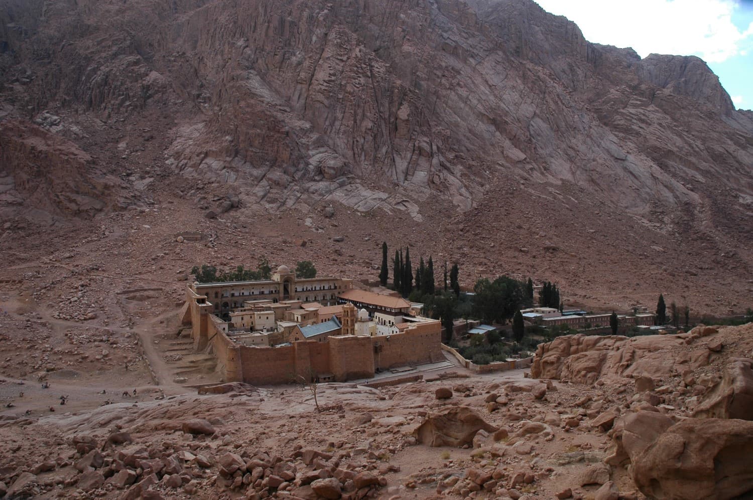 stone monastery situated in a mountainous rocky valley